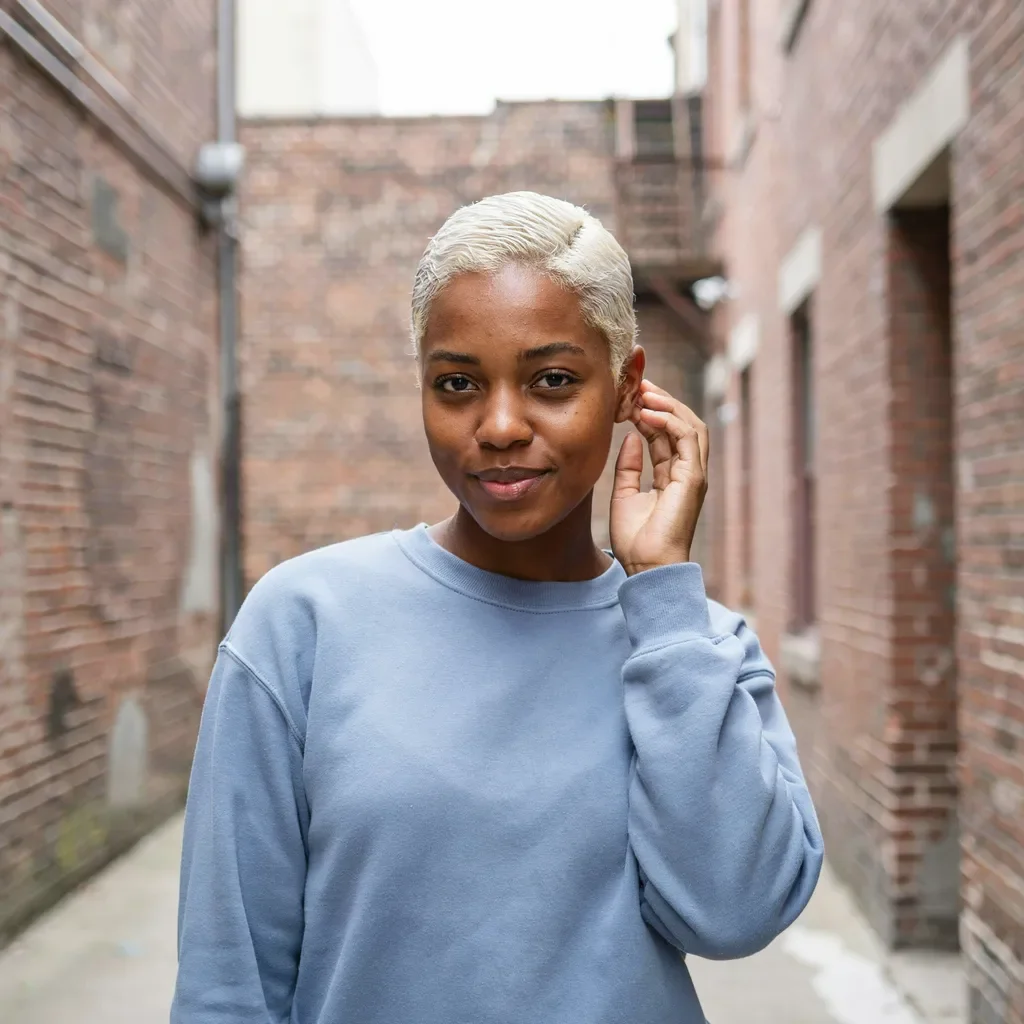 Bleached platinum buzz cut hair color