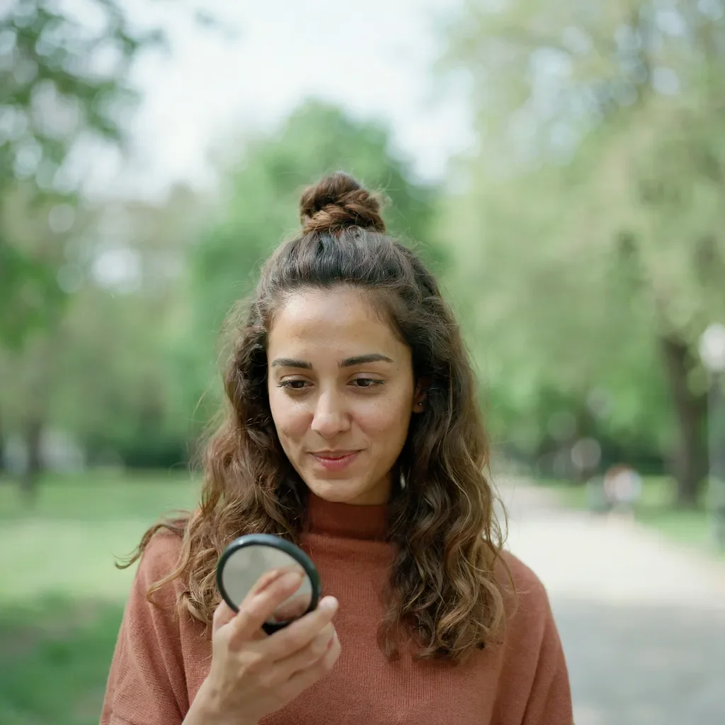 Half-up top knot with loose texture hairstyle
